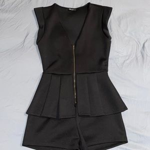 All black shorts romper.